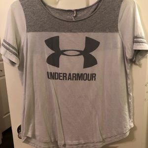 White and gray Under Armour short sleeve shirt.